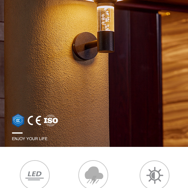 Solar wall lamp with features highlighted on a wooden background
